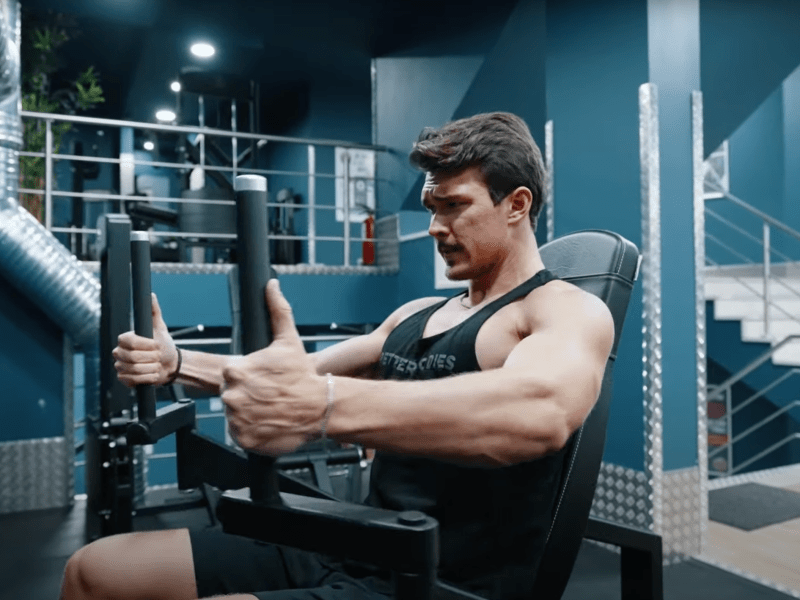 A man using workout equipment in a private gym in Costa Del Sol.