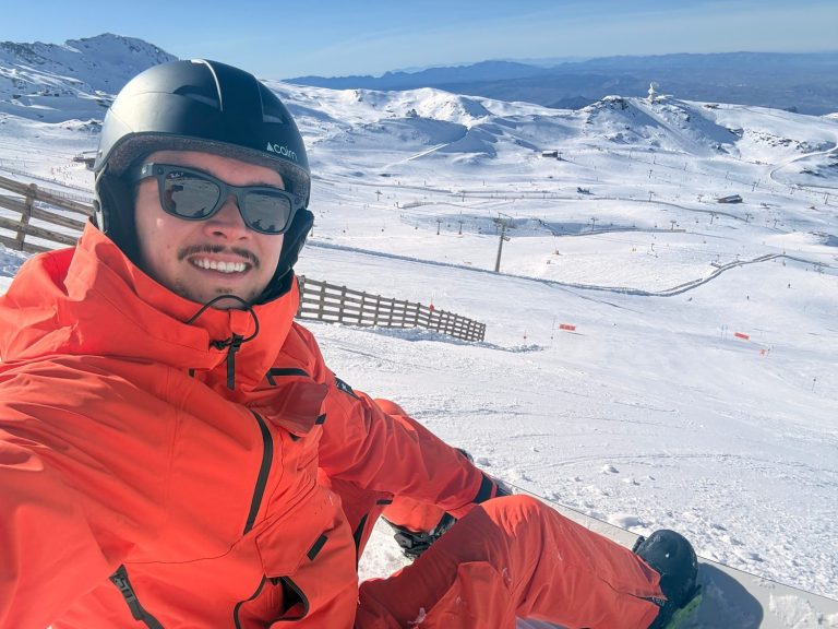 A man on snow slopes about to snowboard in sierra nevada granada.