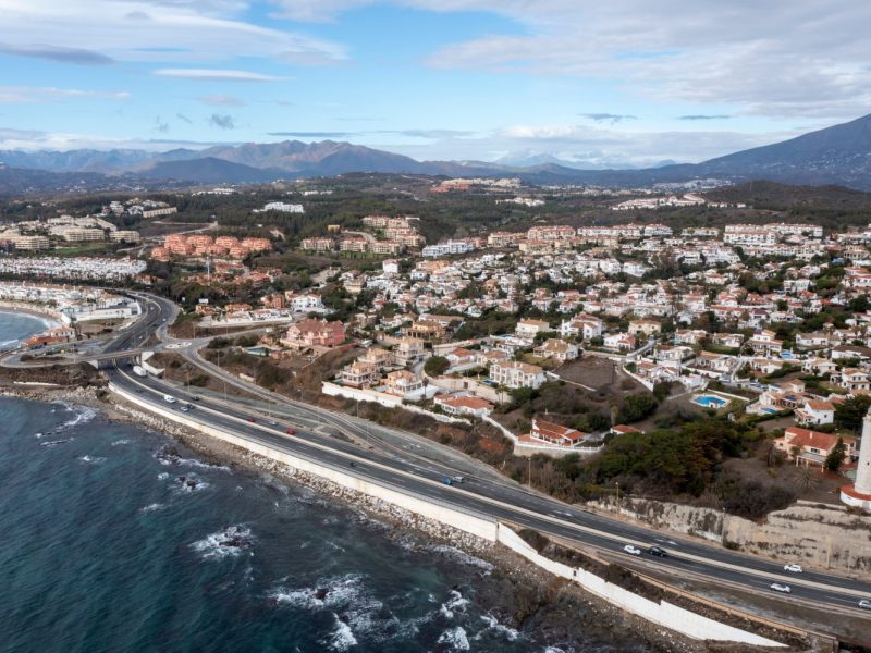 A flyover shot of Punta De Calaburras beach in Spain.