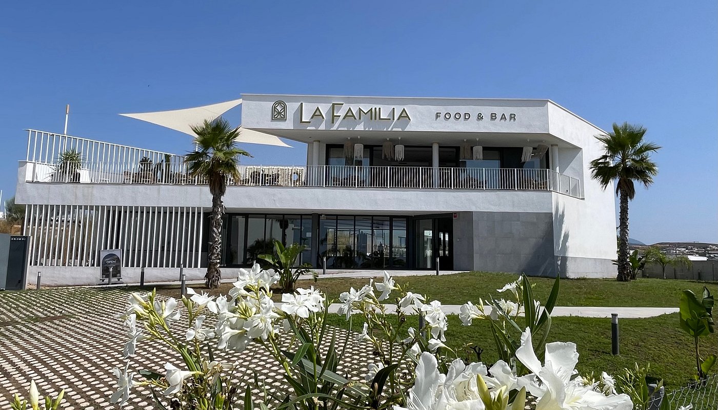 picture of the front of the clubhouse, with la familia on the top floor