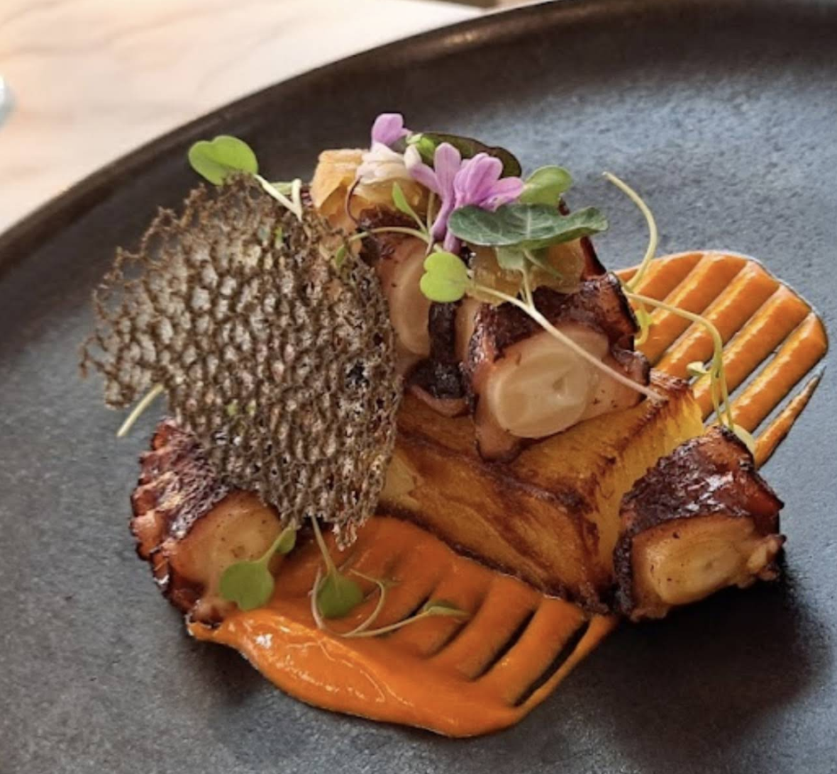 picture of an ikan seafood dish taken inside the restaurant