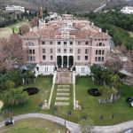 drone shot of the main golf acess and frontal side of the hotel villa padierna