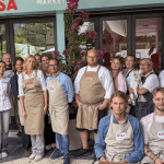 Team standing in front of Spisa foodmarket in Marbella